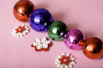 Multi-colored Christmas balls and snowflakes.