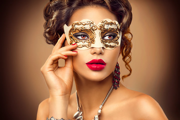 Beauty model woman wearing venetian masquerade carnival mask at party - obrazy, fototapety, plakaty