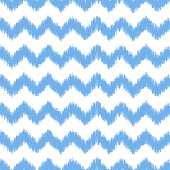 Blue ikat seamless vector pattern. Textile fabric design.