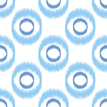 Blue ikat seamless vector pattern. Textile fabric design.