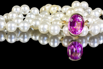 Jewlery on a reflective surface