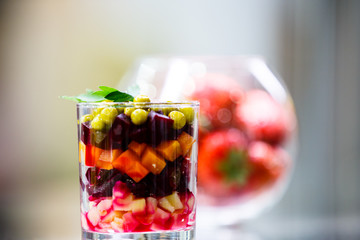 Russian salad Vinaigrette of boiled vegetables (beets, potatoes, carrots) in a glass