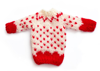 knitted christmas sweater in white and red color, isolated on white