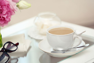 Cup of coffee on table close up