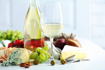 Still life with various types of Italian food and wine