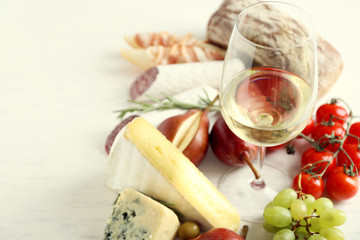 Still life with various types of Italian food and wine