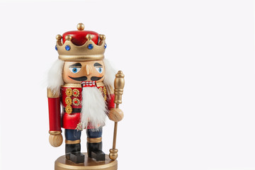 Traditional figurine christmas nutcracker wearing an old military style uniform