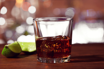 Glass of cocktail on the bar counter