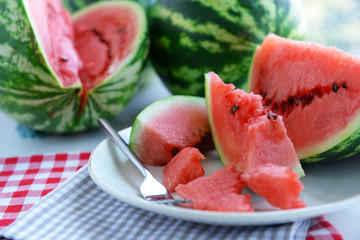Sliced watermelon on plate closeup