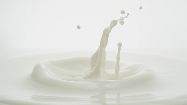Milk bouncing and making splash. Shot with high speed camera, phantom flex 4K.  Slow Motion. Unedited version is included at the end of clip.