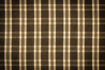 Vintage photo, checkered shirt as background texture