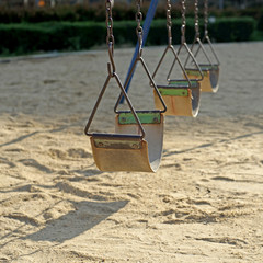 old chain swings in kids playground