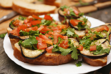 Bruschetta with grilled eggplant and vegetables on ciabatta
