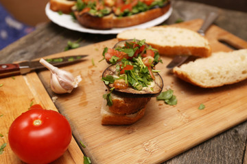 Bruschetta with grilled eggplant and vegetables on ciabatta