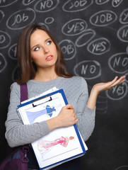 Fototapeta premium Thinking young woman with yes or no choice on gray background