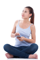 Happy woman using smartphone with looking up.