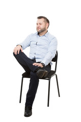man sitting on chair. open posture, greater influence. Isolated white background