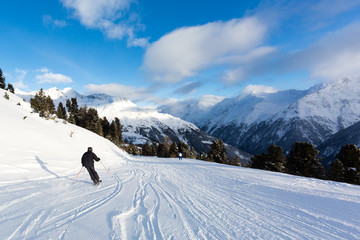 Fototapeta na wymiar Male skier on easy ski piste