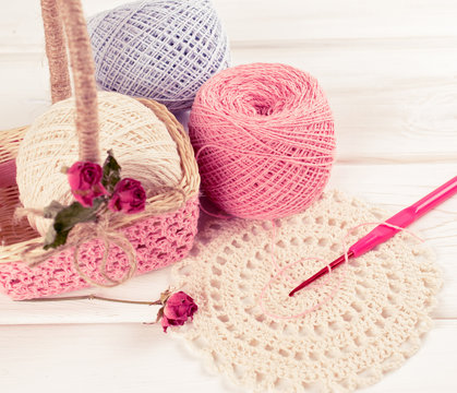 Yarn for crochet and  basket for handmade on white wooden boards