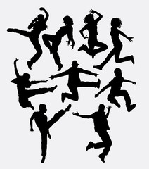 Modern dance. Man and women jumping action silhouette. Good use for symbol, logo, web icon, mascot, game elements, or any design you want. Easy to use, edit, or change color.