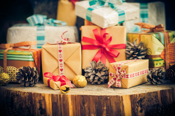 Santa Claus Christmas gifts packets cones wooden table
