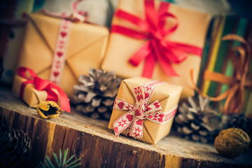 Santa Claus Christmas gifts packets cones wooden table
