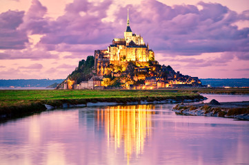 Mont Saint-Michel, France, on sunset - obrazy, fototapety, plakaty
