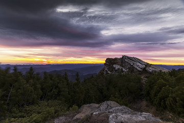 Sunrise in the mountains with spectacular sky one morning stormy