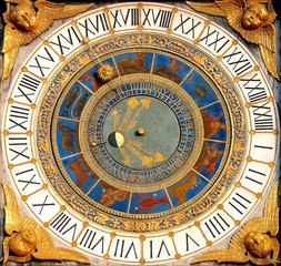 Fototapeta na wymiar Renaissance Astronomical clock in Brescia, Italy (1540-50). Displays hours, moon phases and the zodiac.