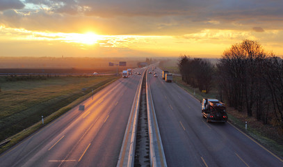 Traffic on highway with cars.