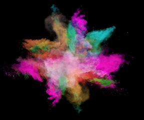 Obraz premium Freeze motion of colored dust explosions on black background