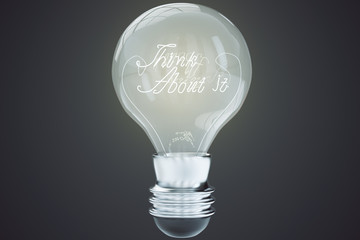 Think about it concept with light bulb at black background