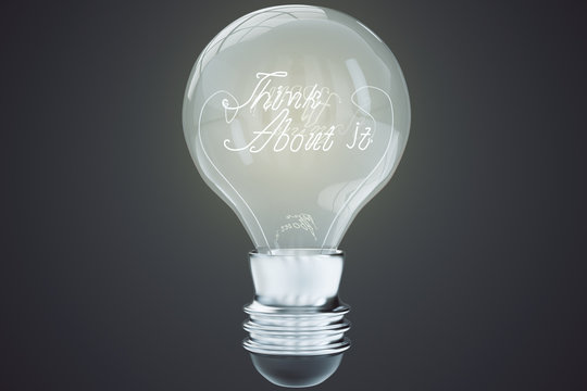 Think About It Concept With Light Bulb At Black Background