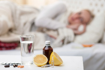 Sick young woman is suffering from influenza