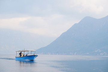 The image of boat in a Kotor  bay, Montenegro