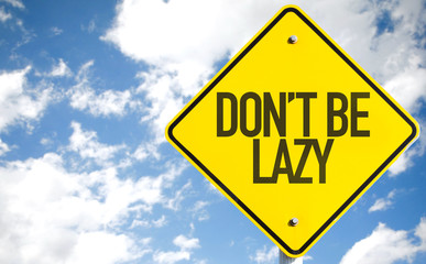 Don't Be Lazy sign with sky background