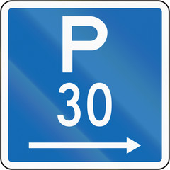 New Zealand road sign - Parking permitted during standard hours for a maximum time of 30 minutes, on the right of this sign