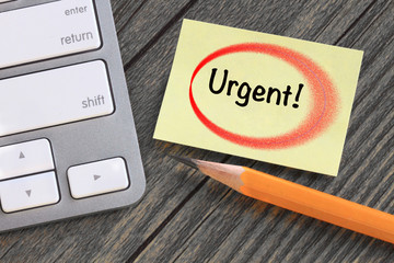 urgent message on a note