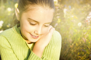 Happy smiling girl in autumn