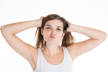 Young brunette woman making a funny face