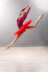  Ballerina is wearing a white tutu and pointe shoes