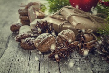 Christmas presents and symbols, rustic wood background