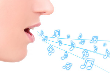music concept - female mouth singing over white