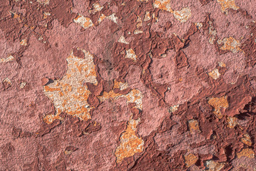 old chipped plaster on the concrete wall texture background