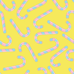 Obraz premium Vector seamless pattern with christmas candies on yellow background