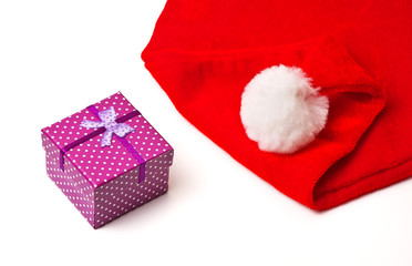 Obraz na płótnie Canvas Santa Claus red and white hat and christmas gift 