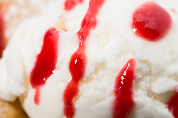 Cinnamon bun with ice cream.