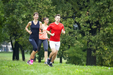 Young people running in the park