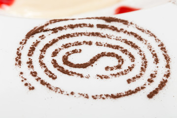 Cinnamon powder on a plate.