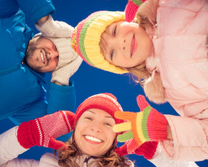 Happy family in winter